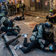 Pro-democracy protesters are brutalized by Hong Kong police in Wan Chai district on October 6, 2019